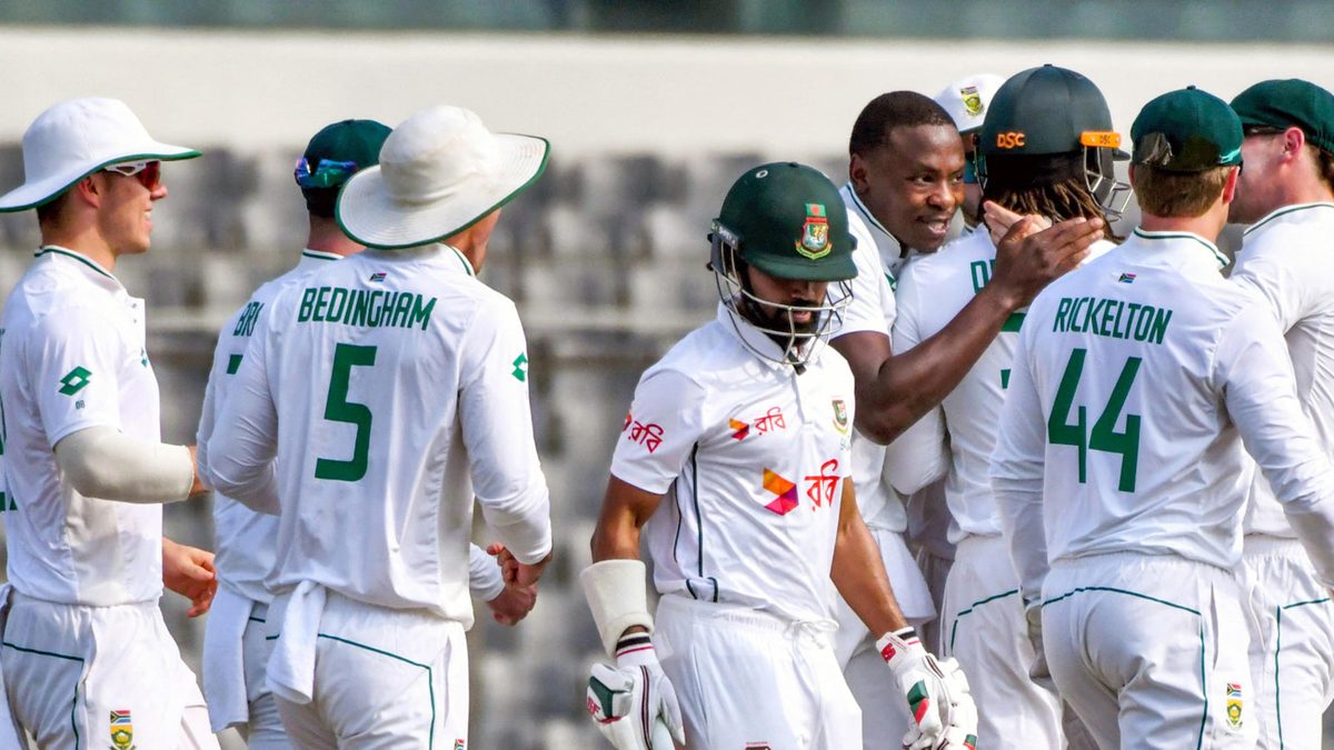 South Africa's Kagiso Rabada (4R) celebrates with teammates after taking the wicket of Bangladesh's Shadman Islam (4L) during the second day of the first Test cricket match between Bangladesh and South Africa at the Sher-e-Bangla National Cricket Stadium in Dhaka on October 22, 2024. 