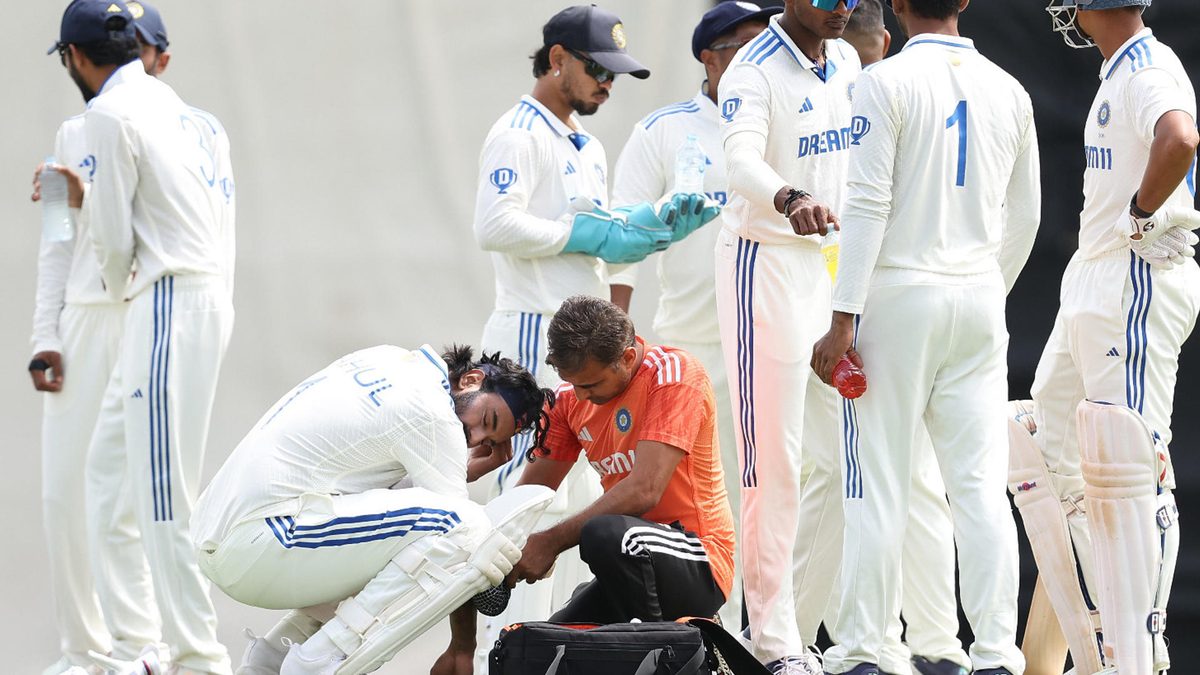 KL Rahul of India receives medical treatment after being struck on his right arm from a delivery by Prasidh Krishna of India during the internal practice match between India and India A at the WACA on November 15, 2024 in Perth, Australia