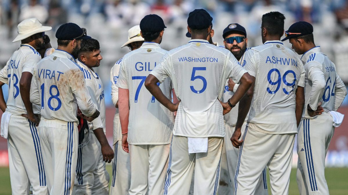 India's captain Rohit Sharma (3R) speaks to his teammates in a drinks break during the second day of the third and final Test cricket match between India and New Zealand at Wankhede Stadium in Mumbai on November 2, 2024