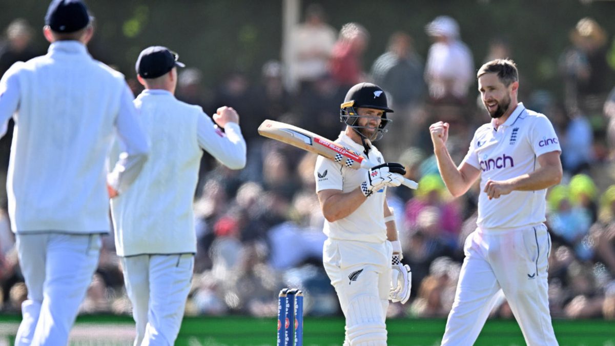 Kane Williamson of New Zealand looks dejected after being dismissed by Chris Woakes of England (R) during day three of the First Test match in the series between New Zealand and England at Hagley Oval on November 30, 2024 in Christchurch, New Zealand