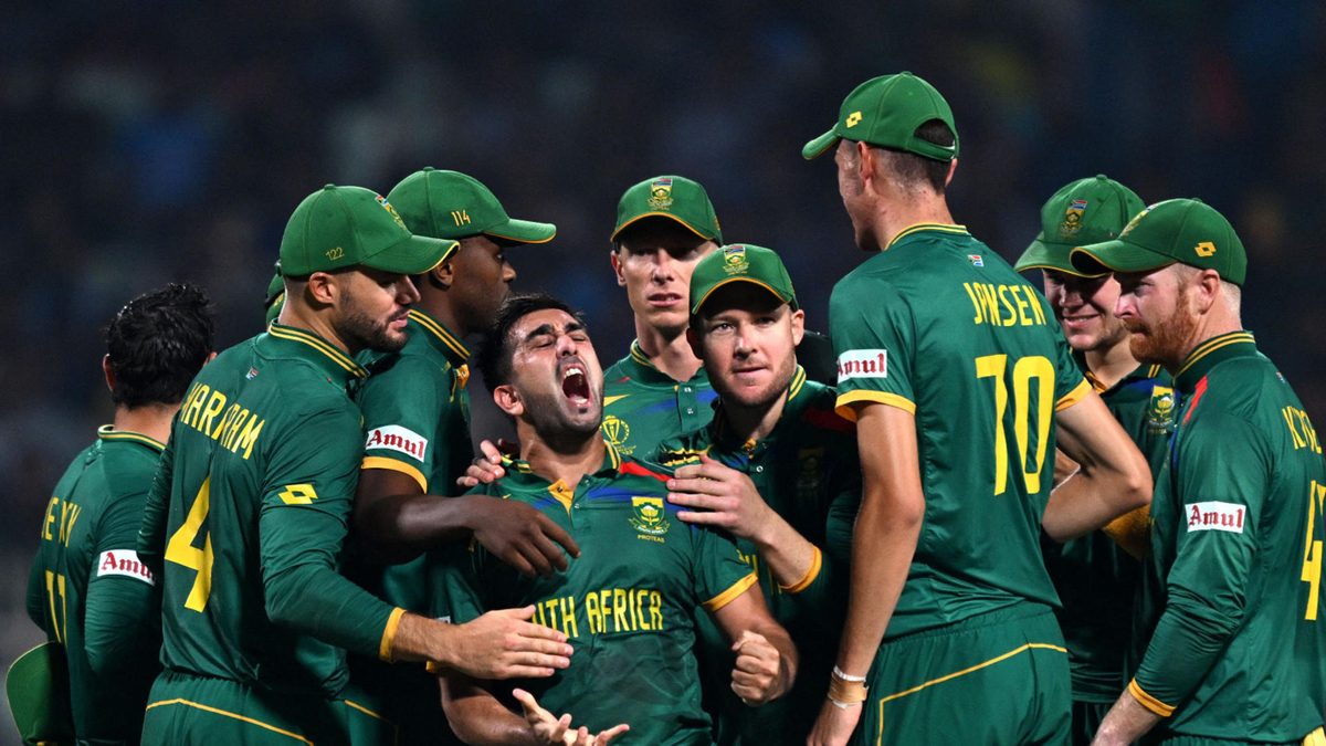 South Africa's Tabraiz Shamsi celebrates with teammates after taking the wicket of Australia's Marnus Labuschagne during the 2023 ICC Men's Cricket World Cup one-day international (ODI) second semi-final match between Australia and South Africa at the Eden Gardens in Kolkata on November 16, 2023.