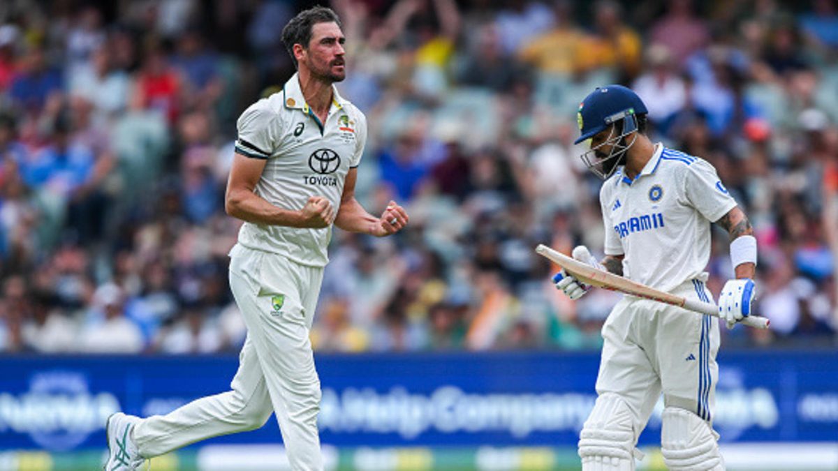 Mitchell Starc of Australia celebrates the wicket of Virat Kohli of India during day one of the Men's Test Match series between Australia and India at Adelaide Oval on December 06, 2024 in Adelaide, Australia