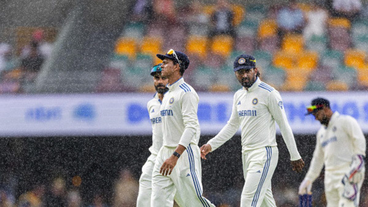 Indian team walking off the field after rain stops play during Day 1 of the third NRMA Insurance Test match of Border Gavaskar trophy between Australia and India at the The Gabba on December 14, 2024 in Brisbane, Australia